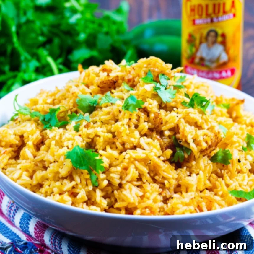 Perfect Mexican Rice in a bowl, showcasing its vibrant color and fluffy texture.