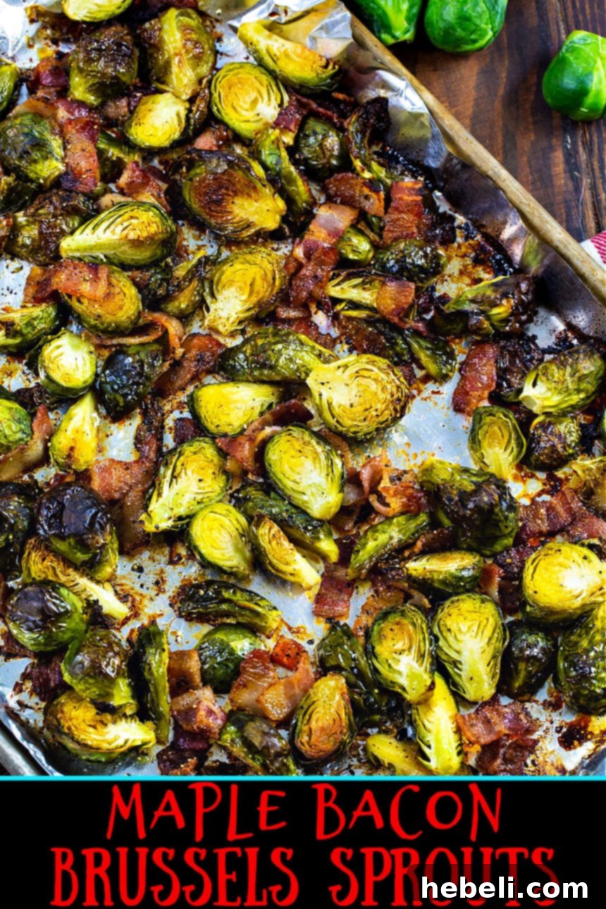 Sweet and Savory Maple Bacon Brussels Sprouts 3 Maple Bacon Brussels Sprouts spread evenly on a baking sheet, ready for roasting, with visible pieces of bacon.
