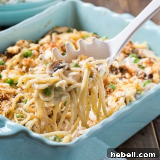 Classic Turkey Tetrazzini with peas, mushrooms, and a rich, creamy sherry sauce.