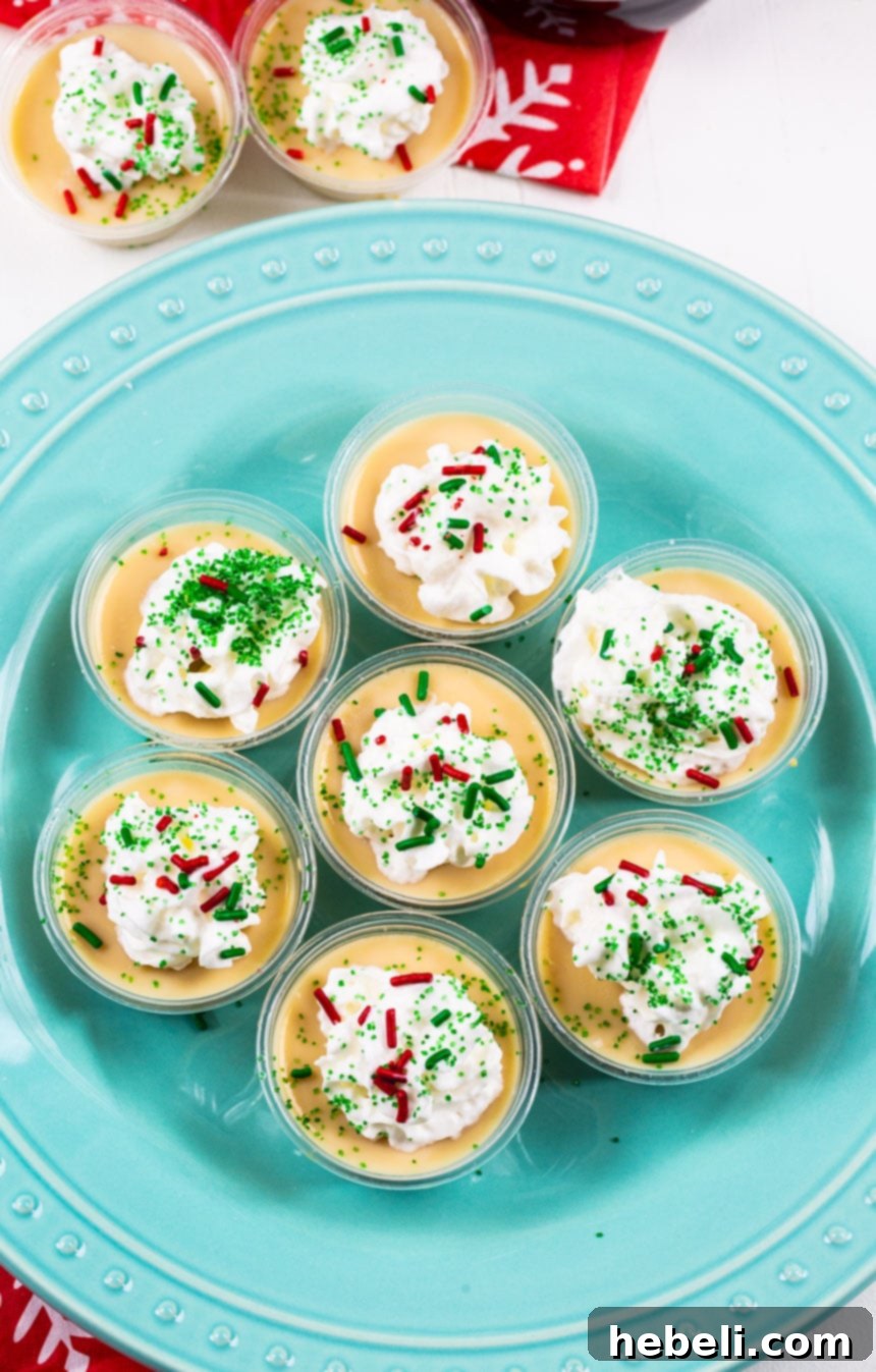 Close-up of Sugar Cookie Jello Shots on a blue plate, showcasing the creamy texture.