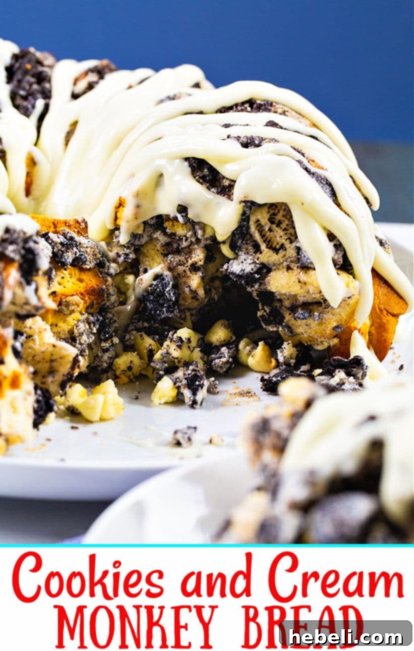 Close-up of Cookies and Cream Monkey Bread with generous cream cheese glaze, ready to be served.