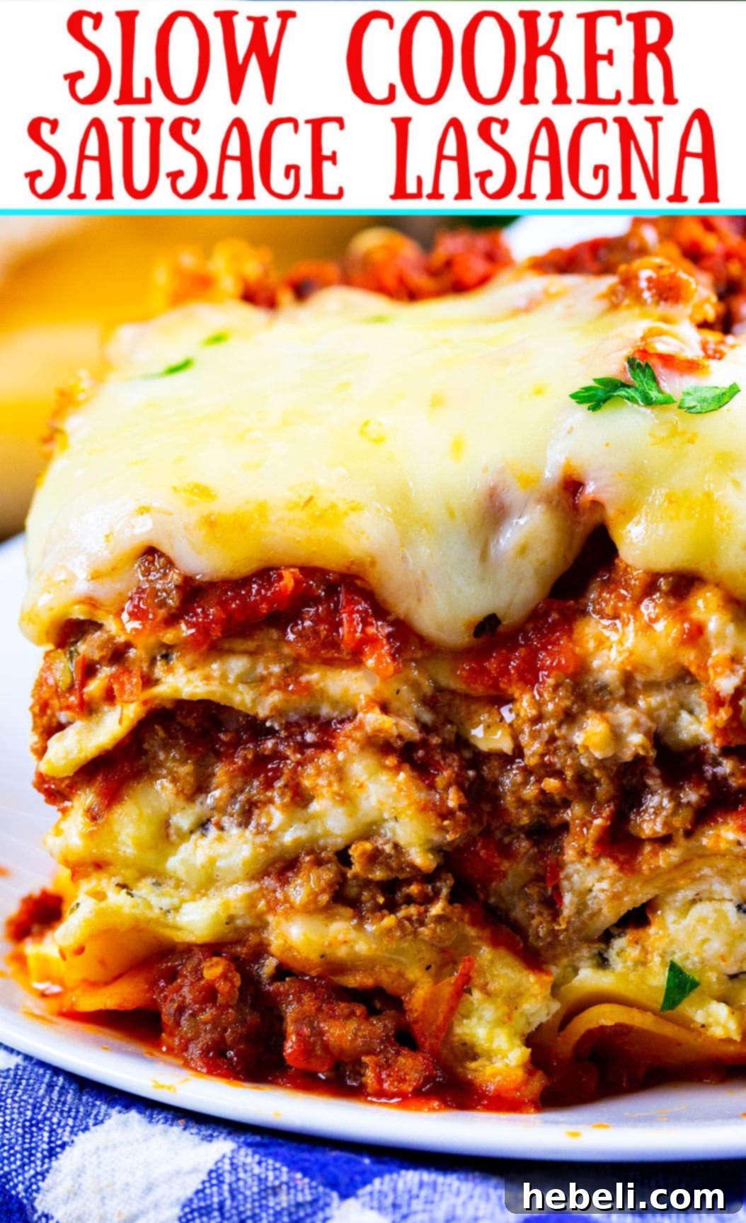 A top-down view of a large portion of slow cooker sausage lasagna, showcasing its layers and rich texture.