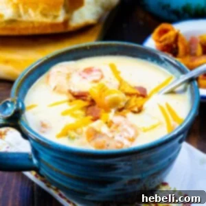 Shrimp and Potato Chowder 5 Close-up of Creamy Potato Soup with Shrimp in a small bowl.