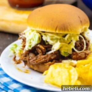Finished Slow Cooker Smokey Pulled Pork ready to serve.