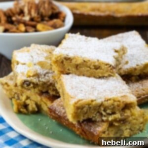 A close-up image of a perfectly baked Charleston Chewie, featuring its golden-brown top and visible pecan pieces.