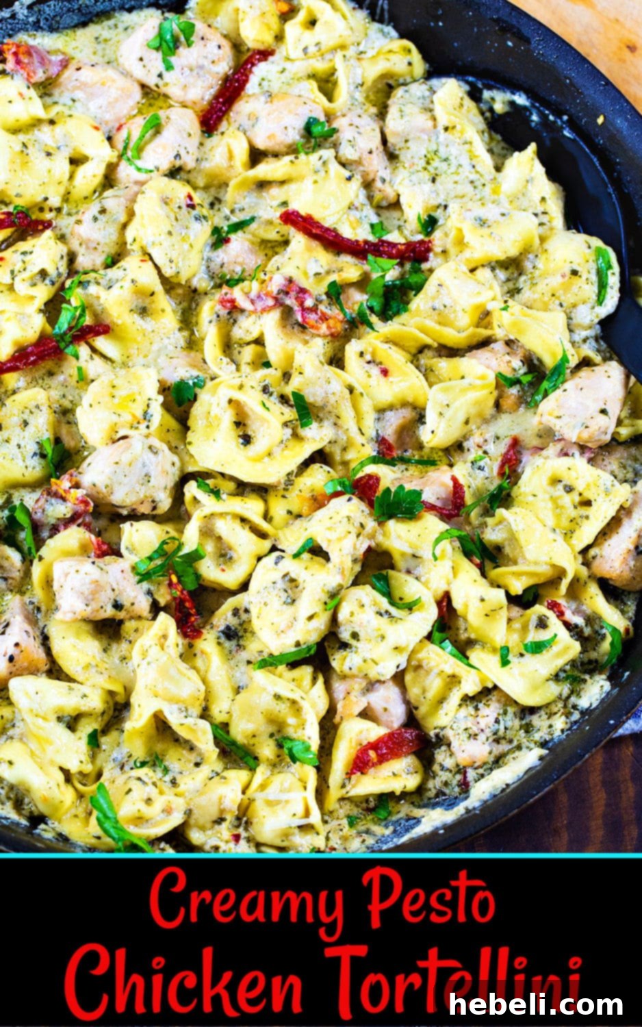 Creamy Chicken Pesto Tortellini 6 A beautifully plated serving of Creamy Pesto Chicken Tortellini in a bowl, garnished with fresh parsley.