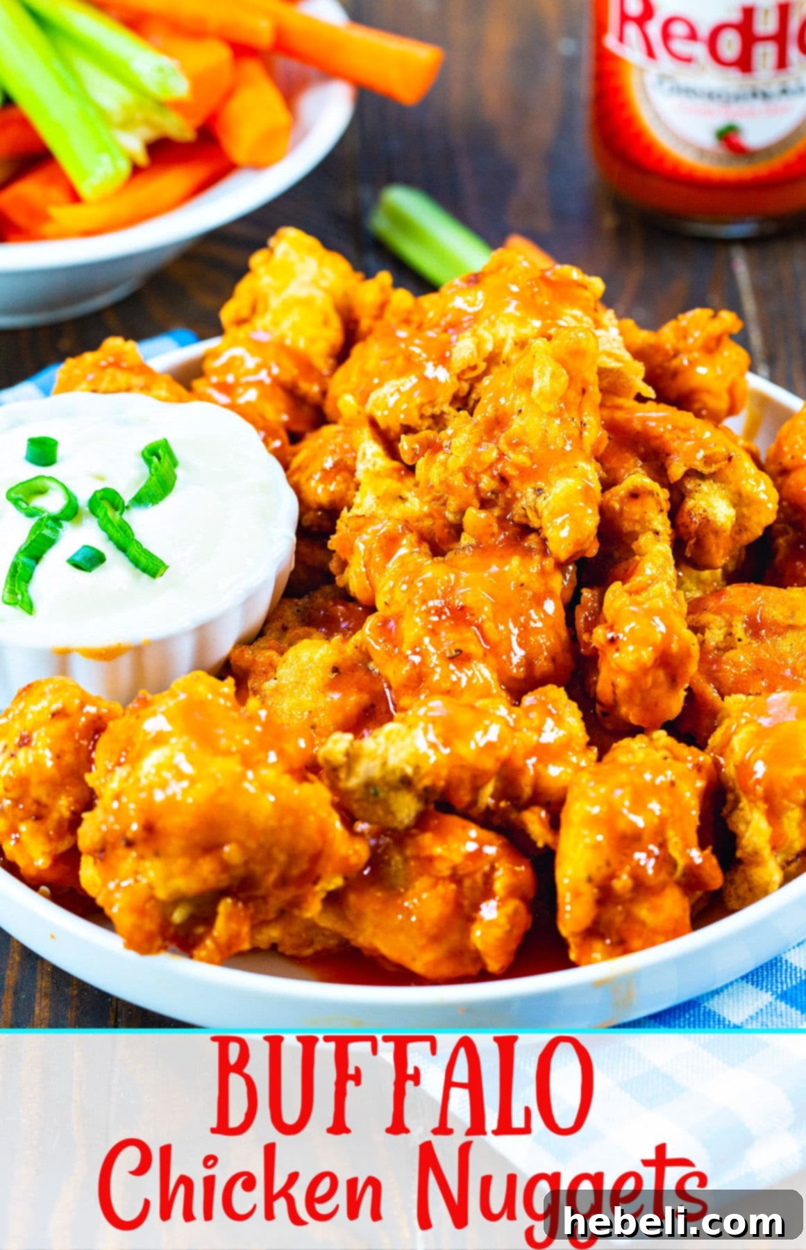 Zesty Buffalo Chicken Bites 6 A beautifully presented plate of Buffalo Chicken Nuggets, garnished and ready to be served, highlighting their golden-brown crispiness.