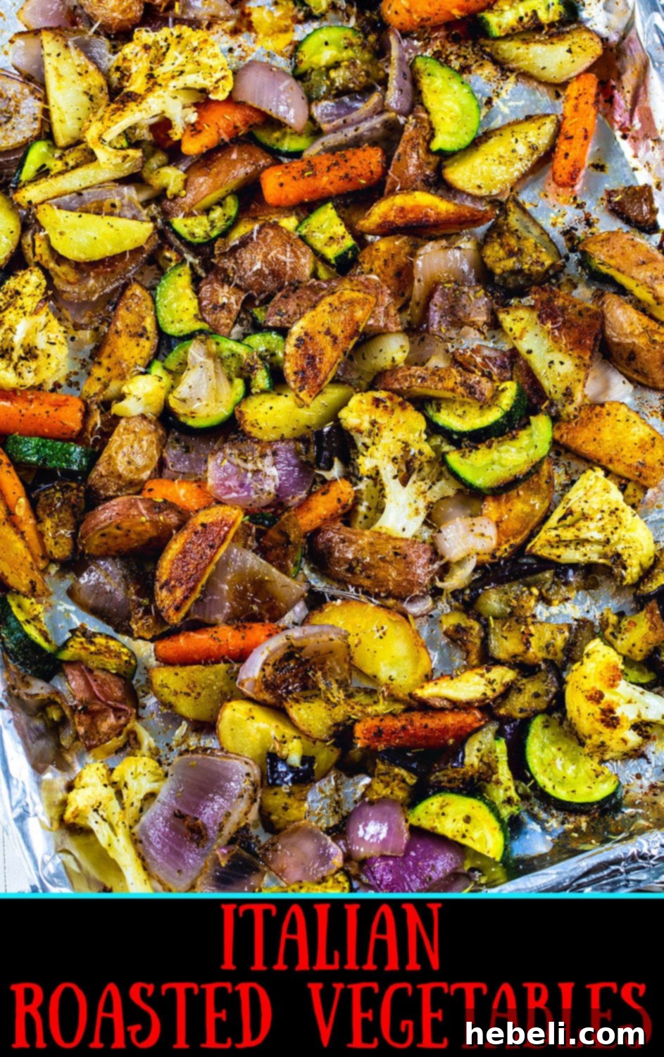 A vibrant bowl of Italian Roasted Vegetables, freshly cooked and garnished with chopped fresh herbs, ready to be served as a delightful and healthy meal component.