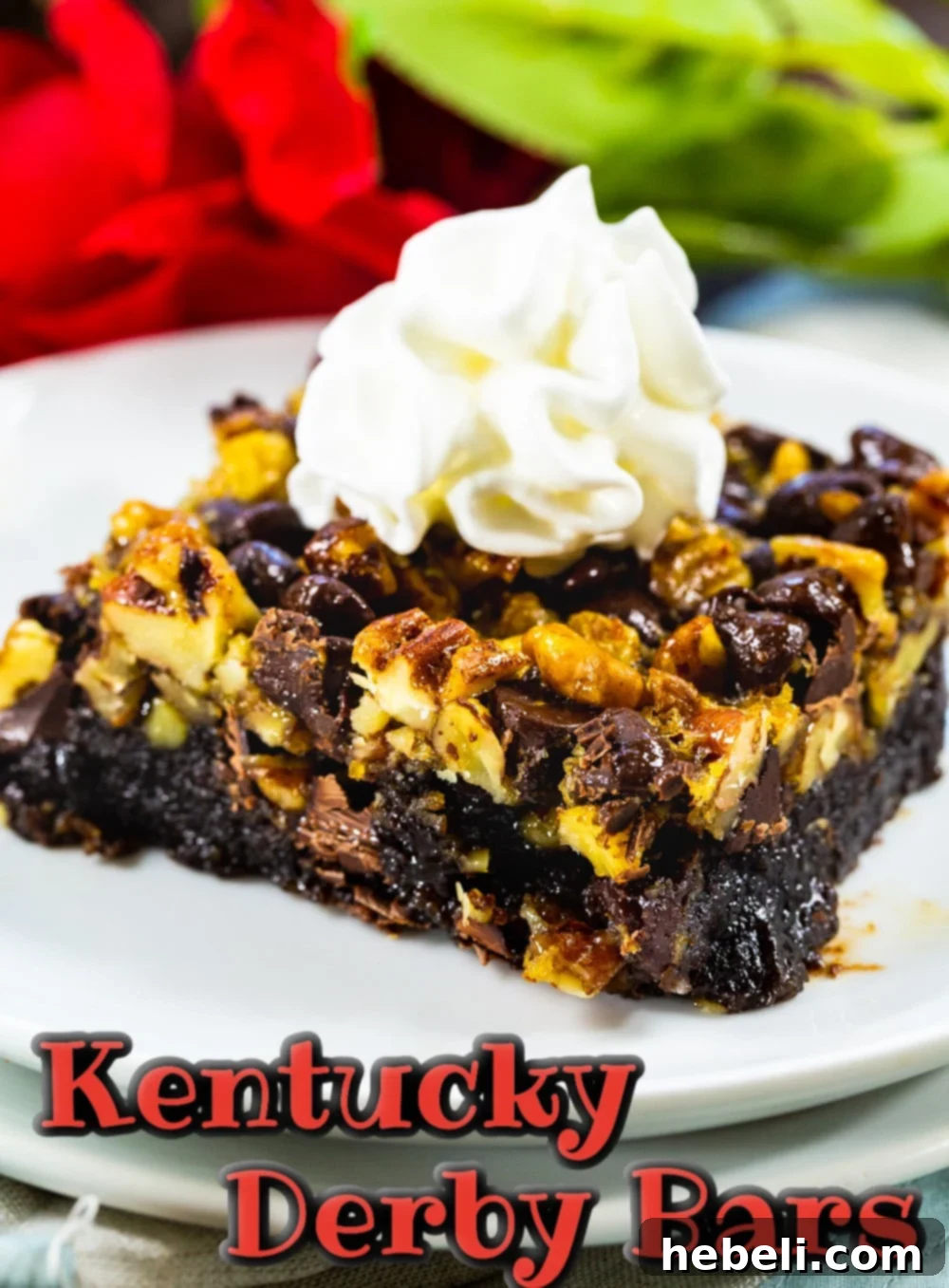 Best Bars for Kentucky Derby Day 5 Close-up of a single Kentucky Derby Bar, topped with a swirl of whipped cream and a hint of mint garnish.