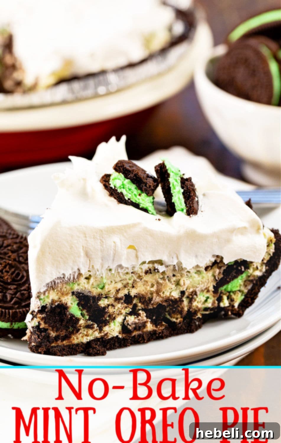 Overhead shot of a No-Bake Mint Oreo Pie, garnished with whole Oreo cookies and showing its creamy texture.