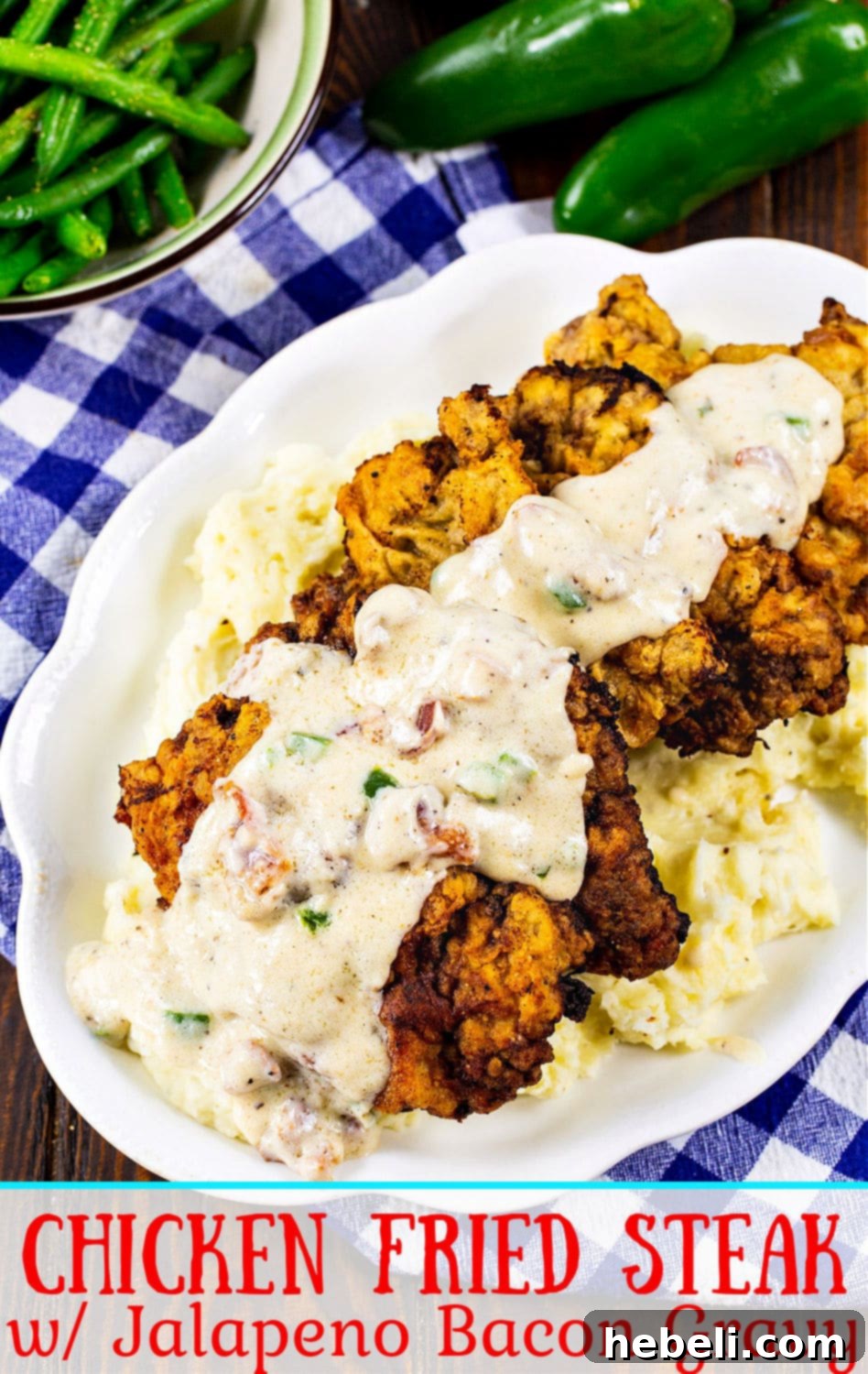 Beautifully plated Chicken Fried Steak with Jalapeño Bacon Gravy, garnished and ready to be served.