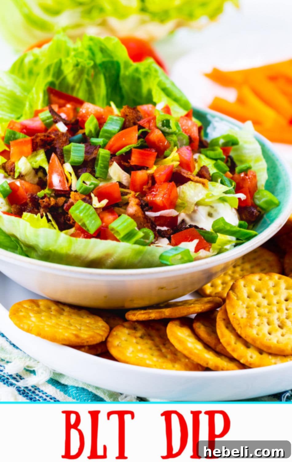 Creamy BLT Dip 5 A top-down view of the freshly prepared BLT Dip, served with an assortment of crackers and colorful vegetable sticks, ready for guests.