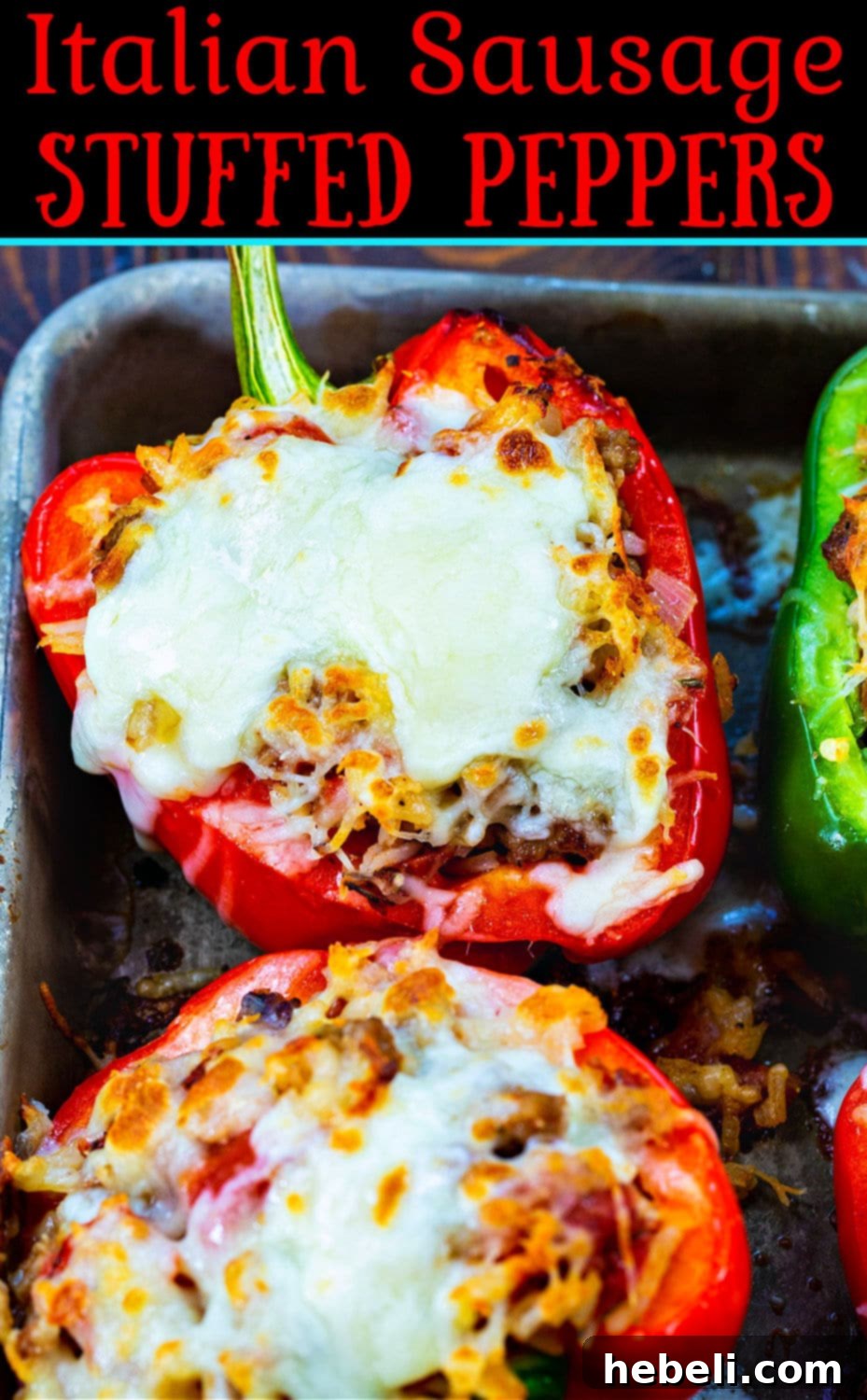 Close-up of a plated Italian Sausage Stuffed Pepper, showing the rich filling and melted cheese.