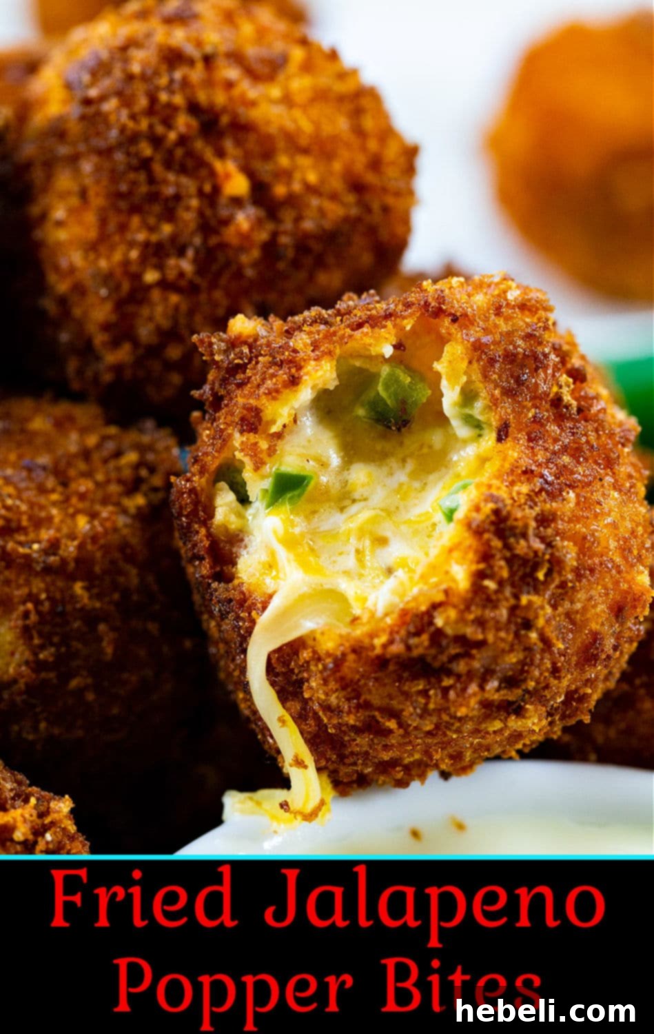 Crispy Jalapeno Poppers 6 A basket of freshly fried Jalapeno Popper Bites, ready to be served.