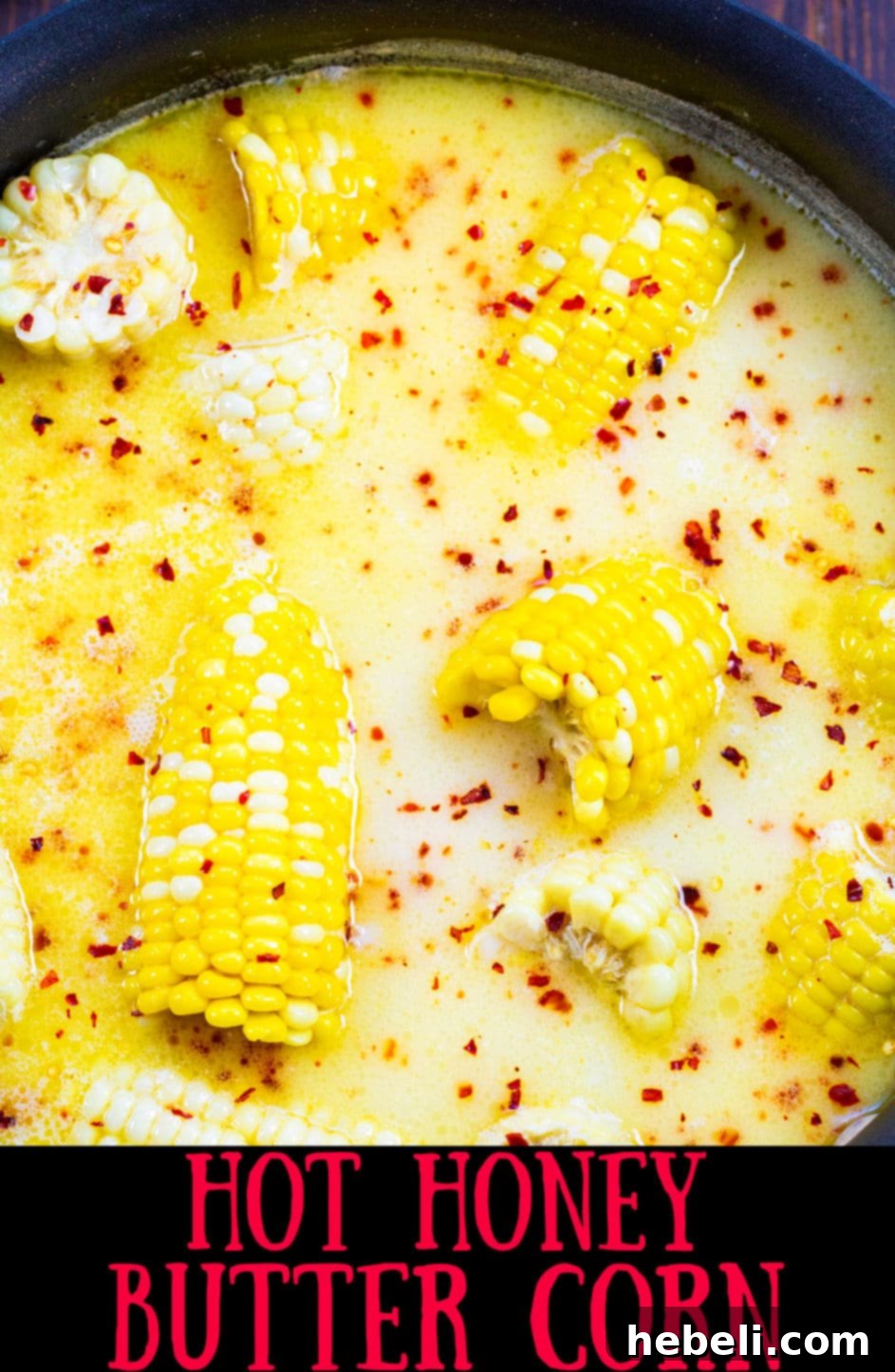 Southern Hot Honey Butter Corn simmering in a large pot, ready to be served