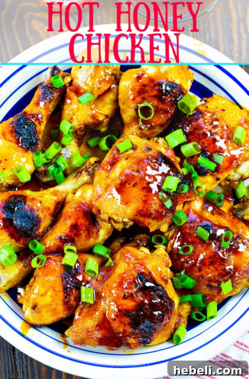 Hot Honey Chicken on a plate, showcasing its crispy skin and glazed coating.
