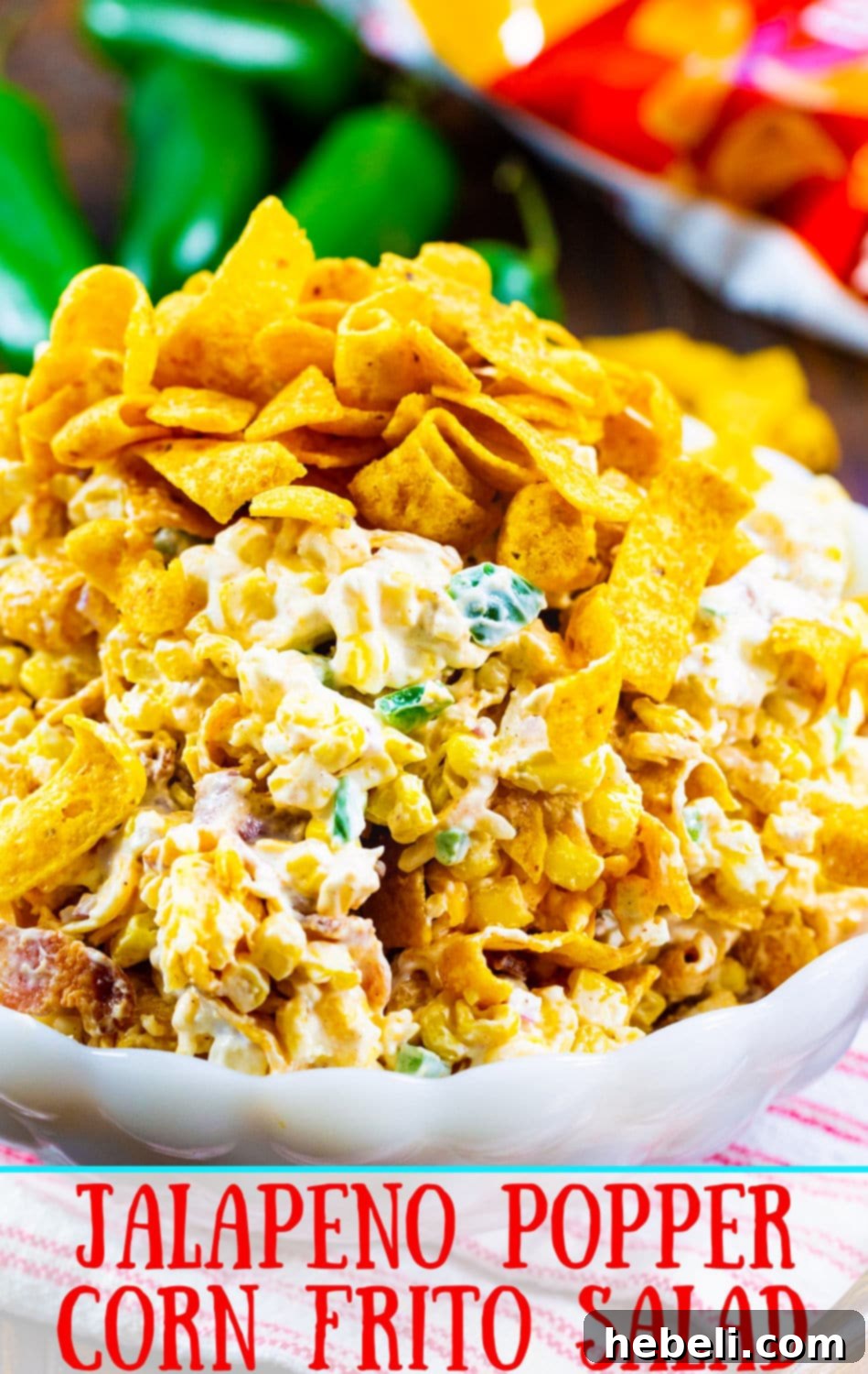Creamy Jalapeno Frito Corn Salad 6 A close-up of the finished Jalapeno Popper Corn Frito Salad, highlighting the texture and topping.