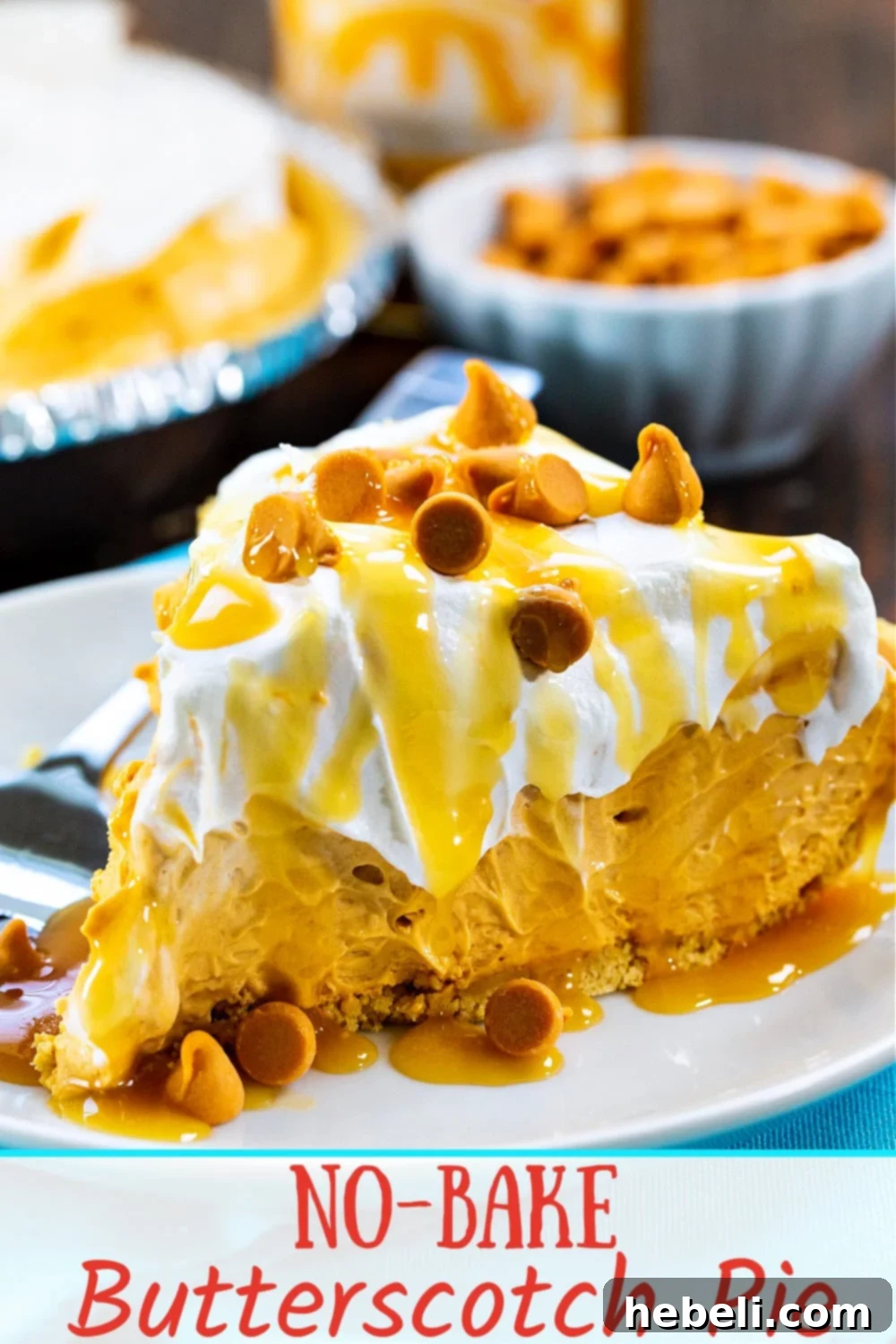A close-up of the entire No-Bake Butterscotch Pie, topped with whipped cream, butterscotch drizzle, and chips, ready to be served.