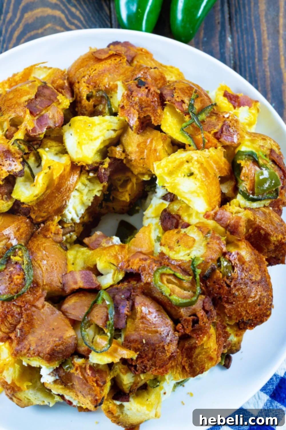Gooey Jalapeno Cheese Bombs 6 Overhead shot of freshly baked Jalapeno Popper Monkey Bread on a large serving plate.