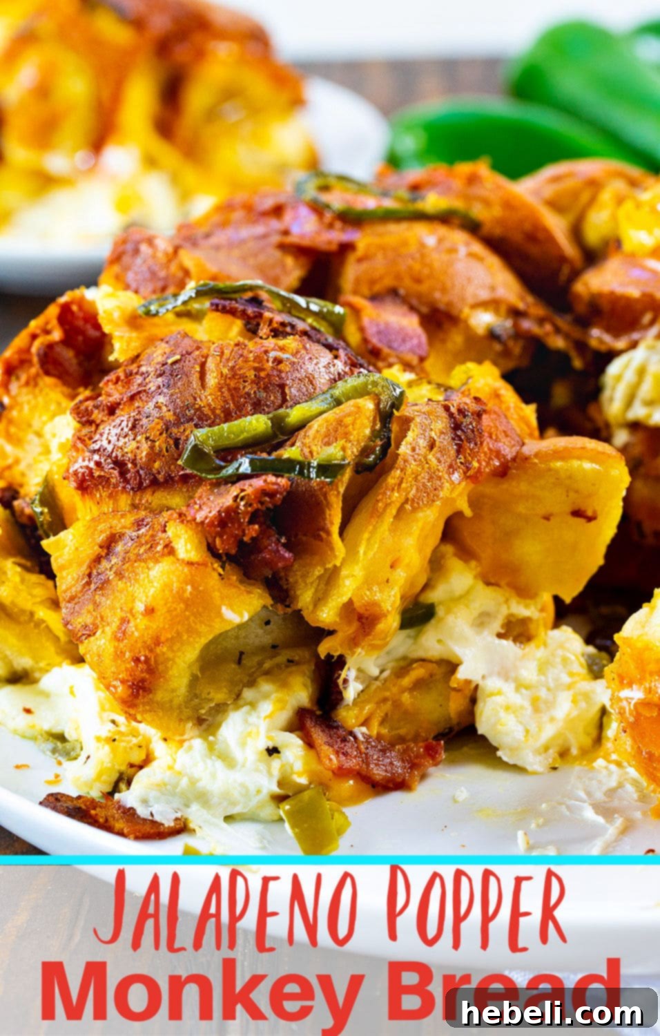 Gooey Jalapeno Cheese Bombs 9 Close-up shot of Jalapeno Popper Monkey Bread, highlighting the golden-brown crust and cheesy interior.