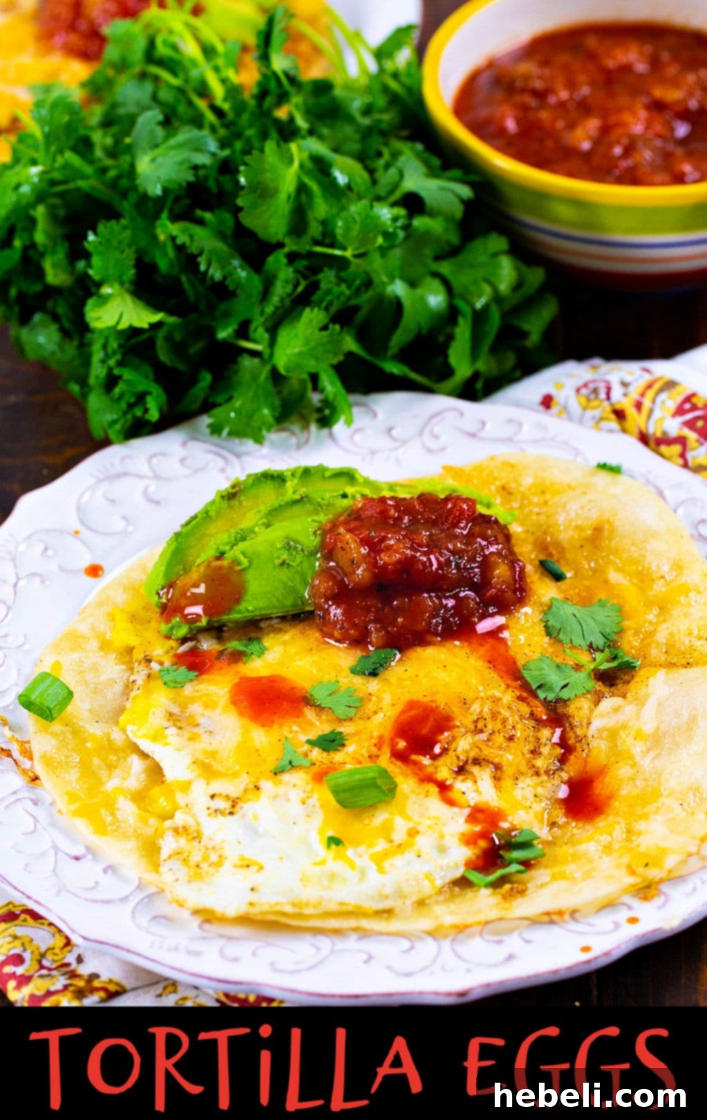 Tortilla Eggs: an egg is cooked on a crispy tortilla for an easy and delicious breakfast.