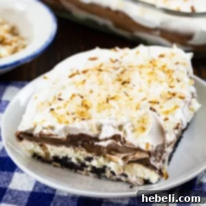 Slice of Chocolate Coconut Lush on a plate.