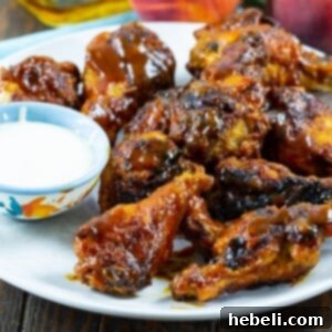 Bourbon Peach BBQ Wings on a plate.