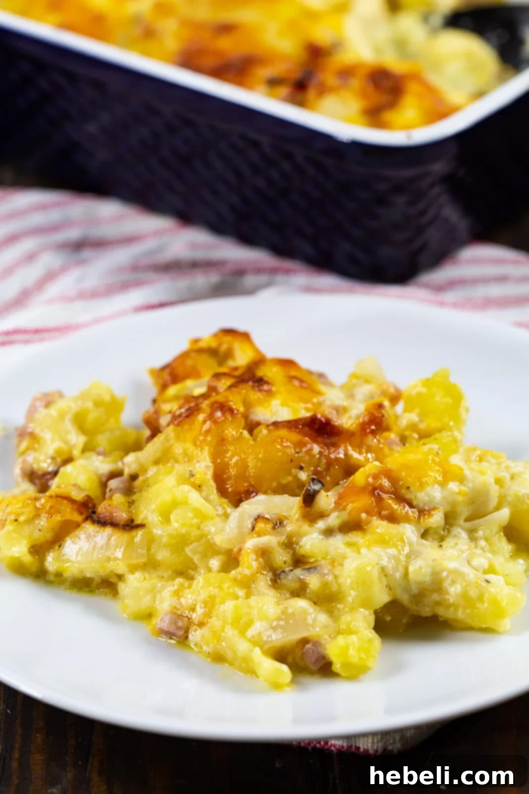 Creamy Ham and Potato Bake 3 A close-up of the creamy sauce mixture, ready to be layered with potatoes and ham.