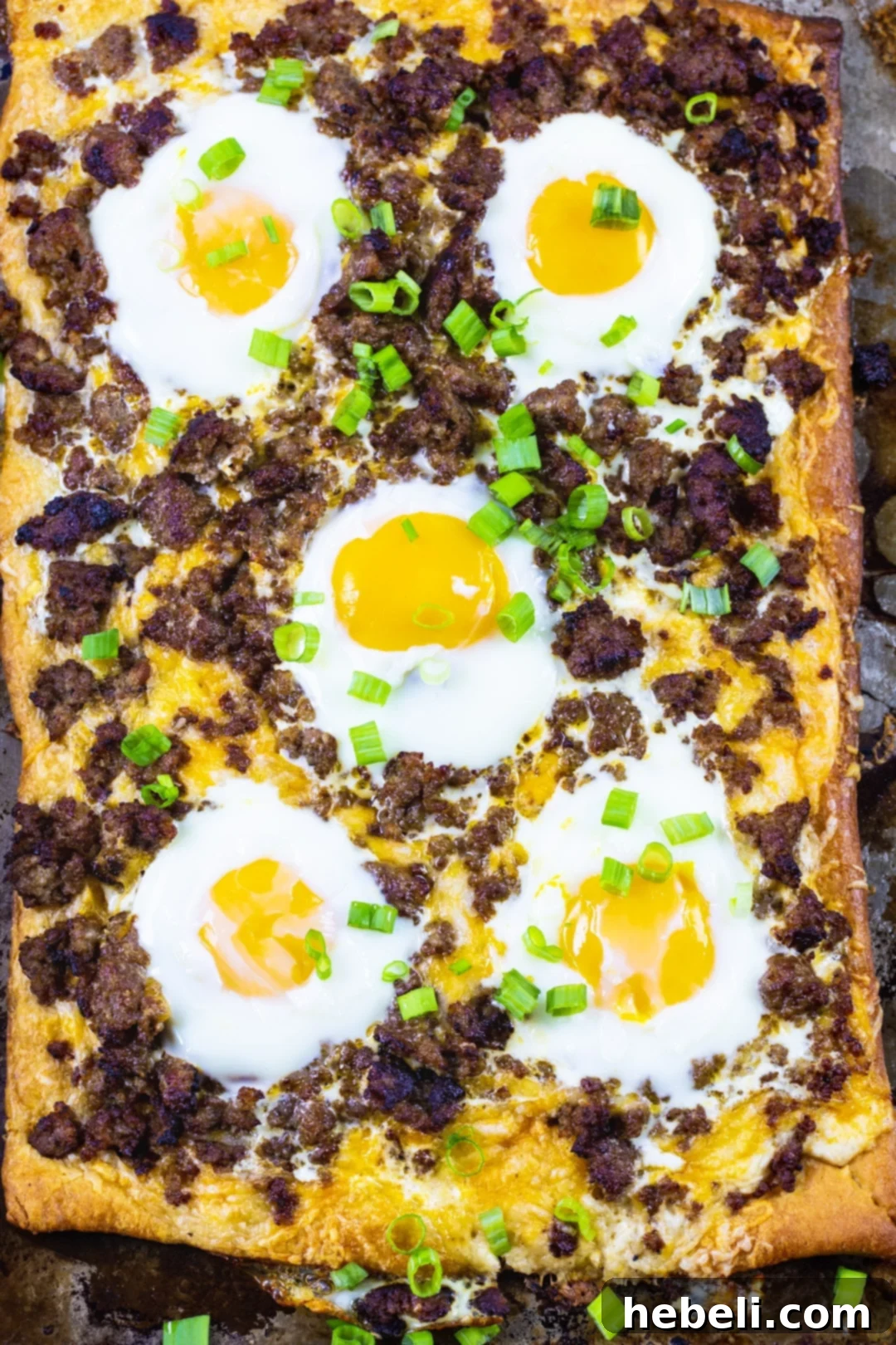 Breakfast Crescent Pizza on baking sheet.