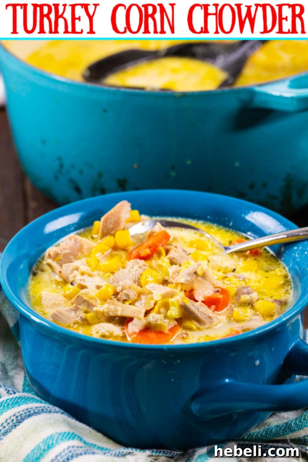 A close-up shot of creamy Turkey Corn Chowder in a stylish blue bowl, ready to be enjoyed.