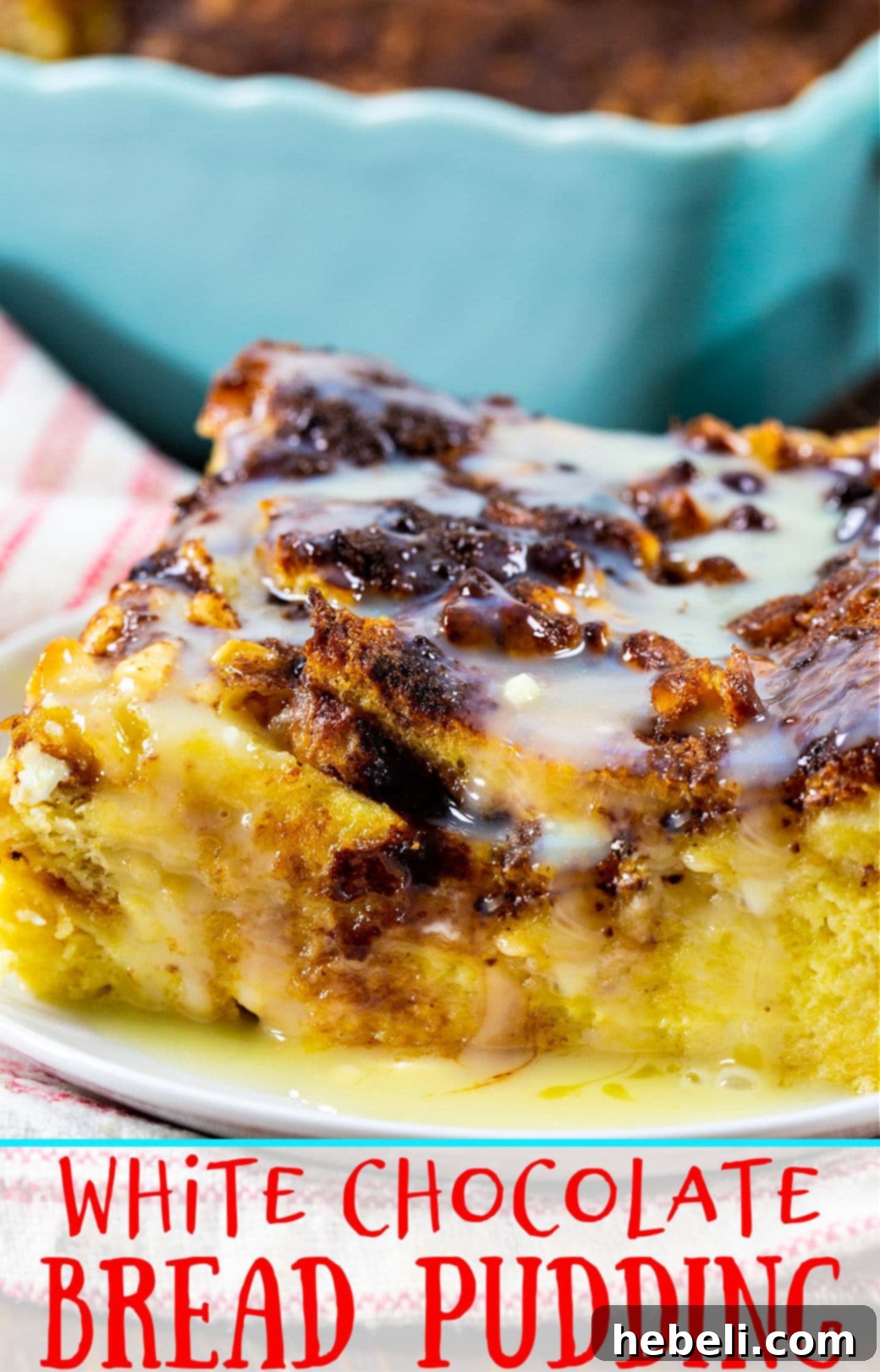 A close-up view of a slice of White Chocolate Bread Pudding, showing its beautiful texture and melted chocolate chips.
