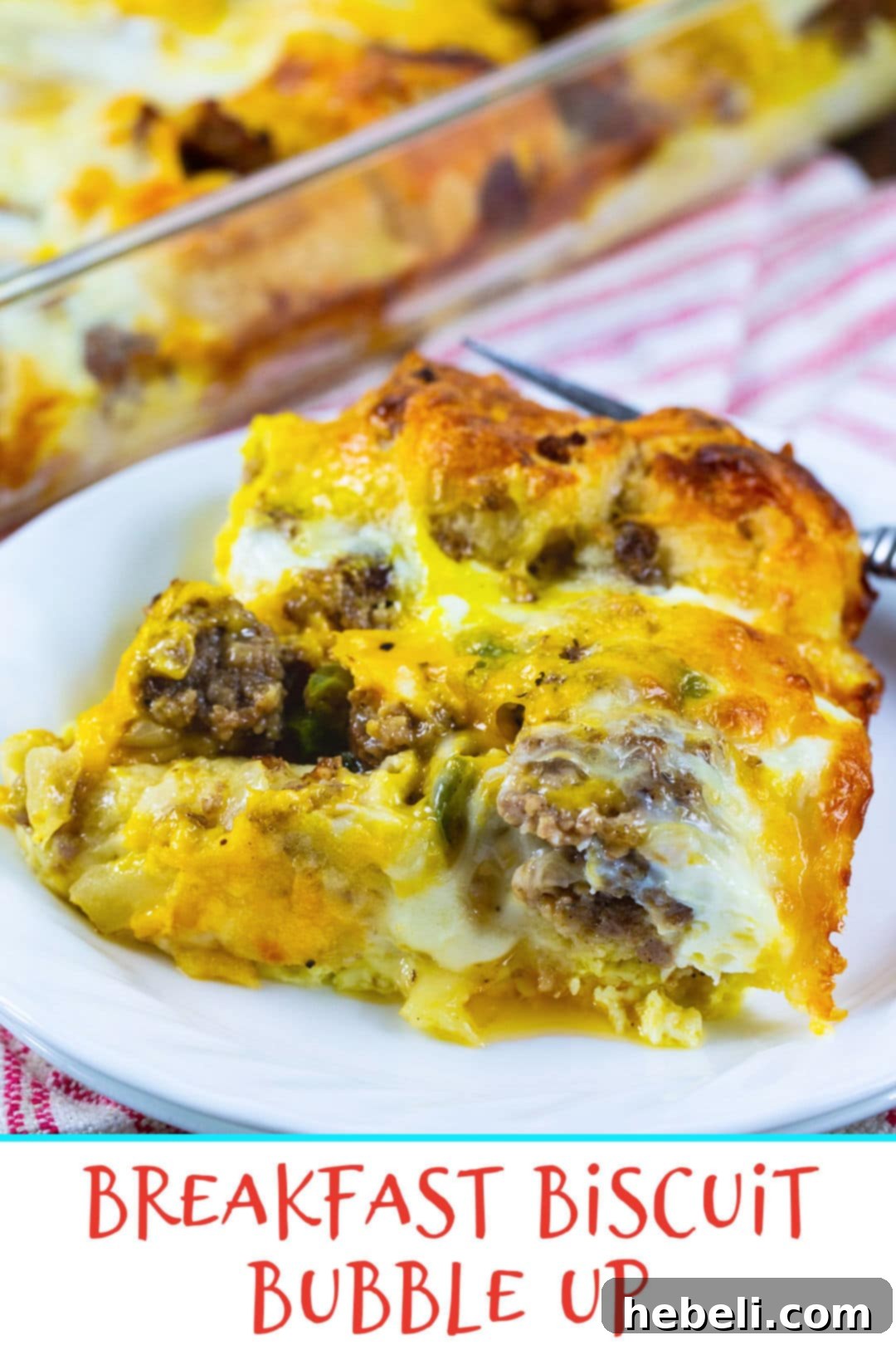 A close-up shot of a single slice of Breakfast Biscuit Bubble Up Casserole on a white plate, garnished with fresh herbs, ready to be enjoyed.