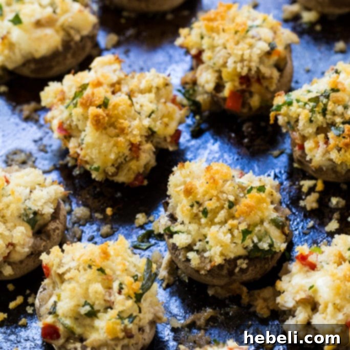 Crab Stuffed Mushrooms with a golden-brown Panko topping, fresh from the oven.