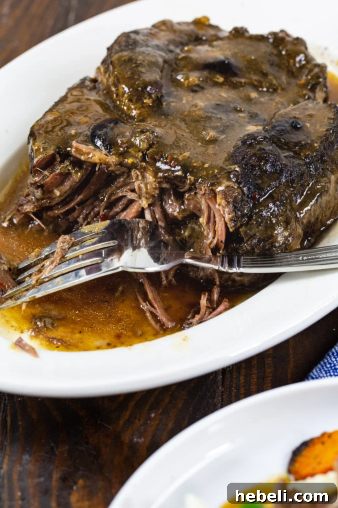 3-Packet Slow Cooker Pot Roast 4 Slow Cooker 3-Packet Pot Roast beautifully arranged on a serving platter, ready to be enjoyed.