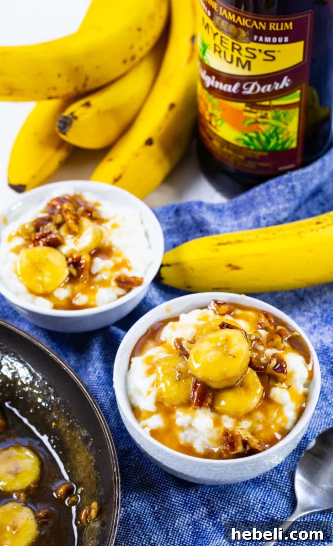 Bananas Foster Rice Pudding Delight 4 Two enticing bowls of Bananas Foster Rice Pudding, ready to be enjoyed.