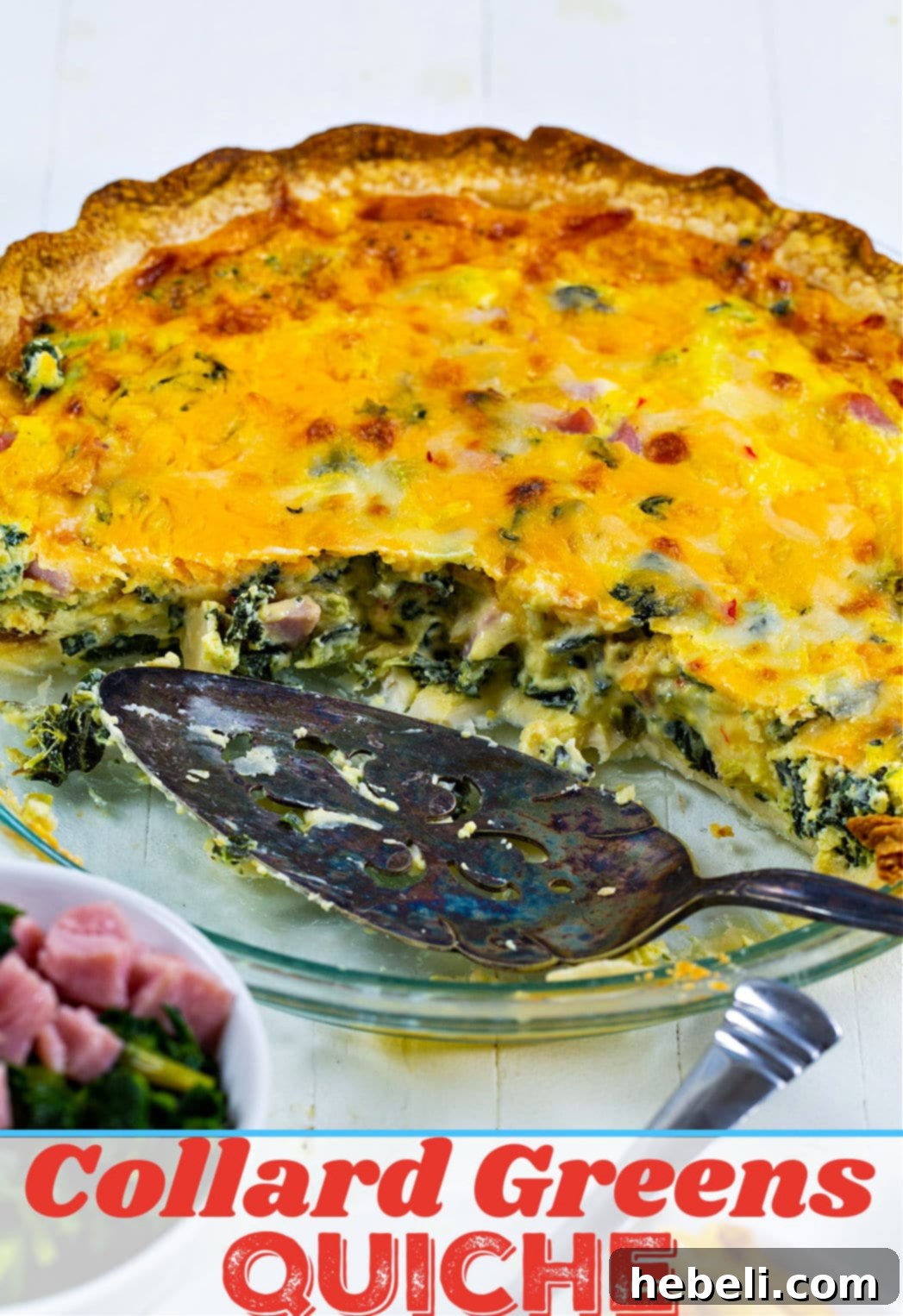 A close-up shot of half of the Southern Collard Greens Quiche still in the pie pan, showing the golden-brown crust and rich filling texture.