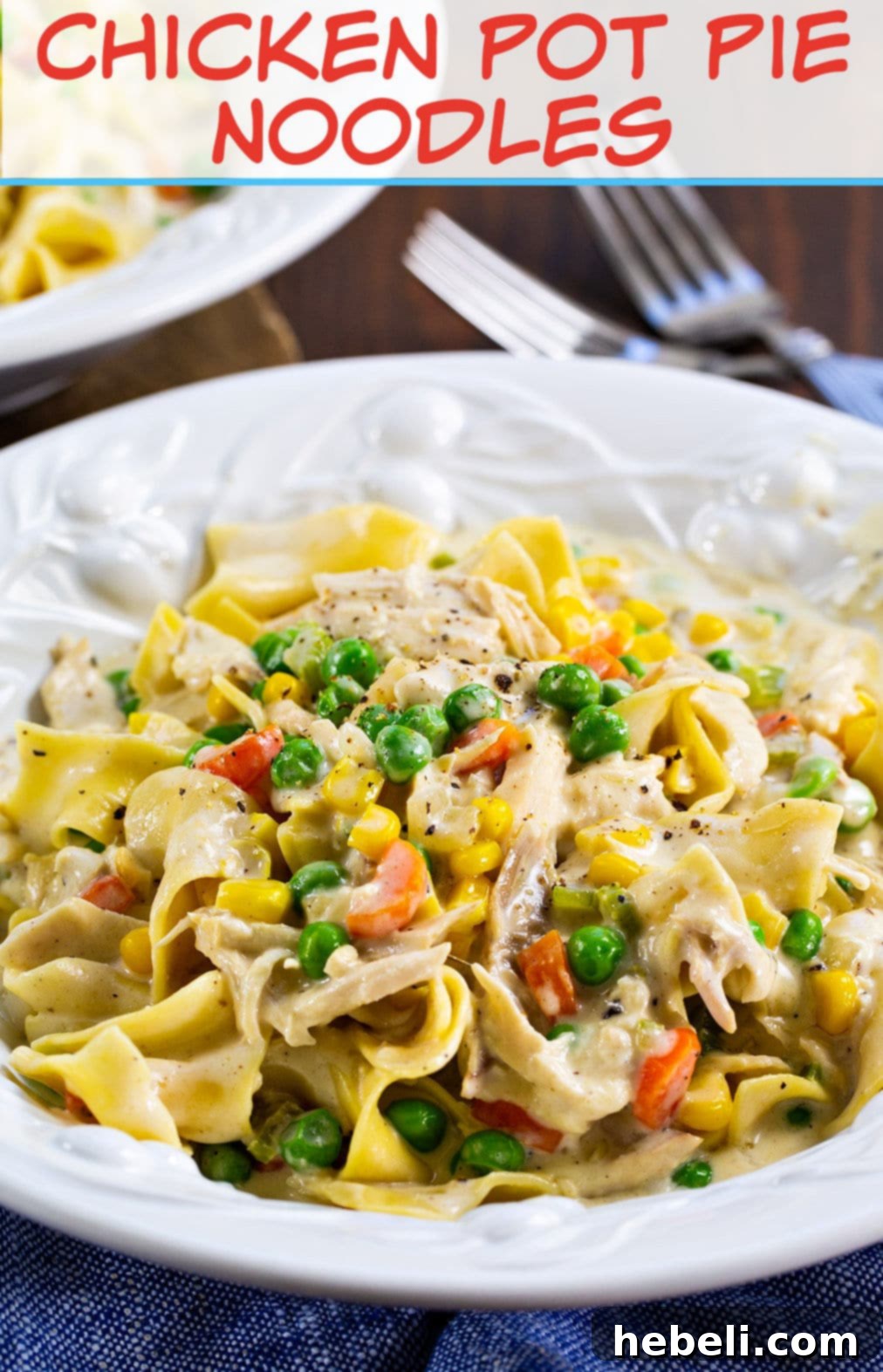 Pot Pie Noodle Casserole 4 A large serving of Chicken Pot Pie Noodles dished up in a pasta bowl, garnished with fresh herbs.