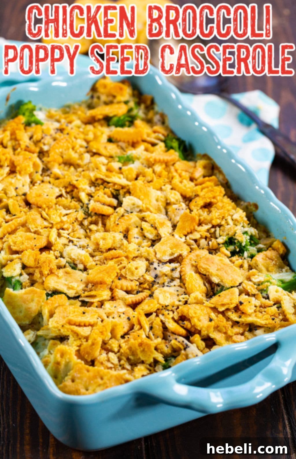 Chicken Broccoli Poppy Seed Casserole in a blue baking dish, freshly baked.