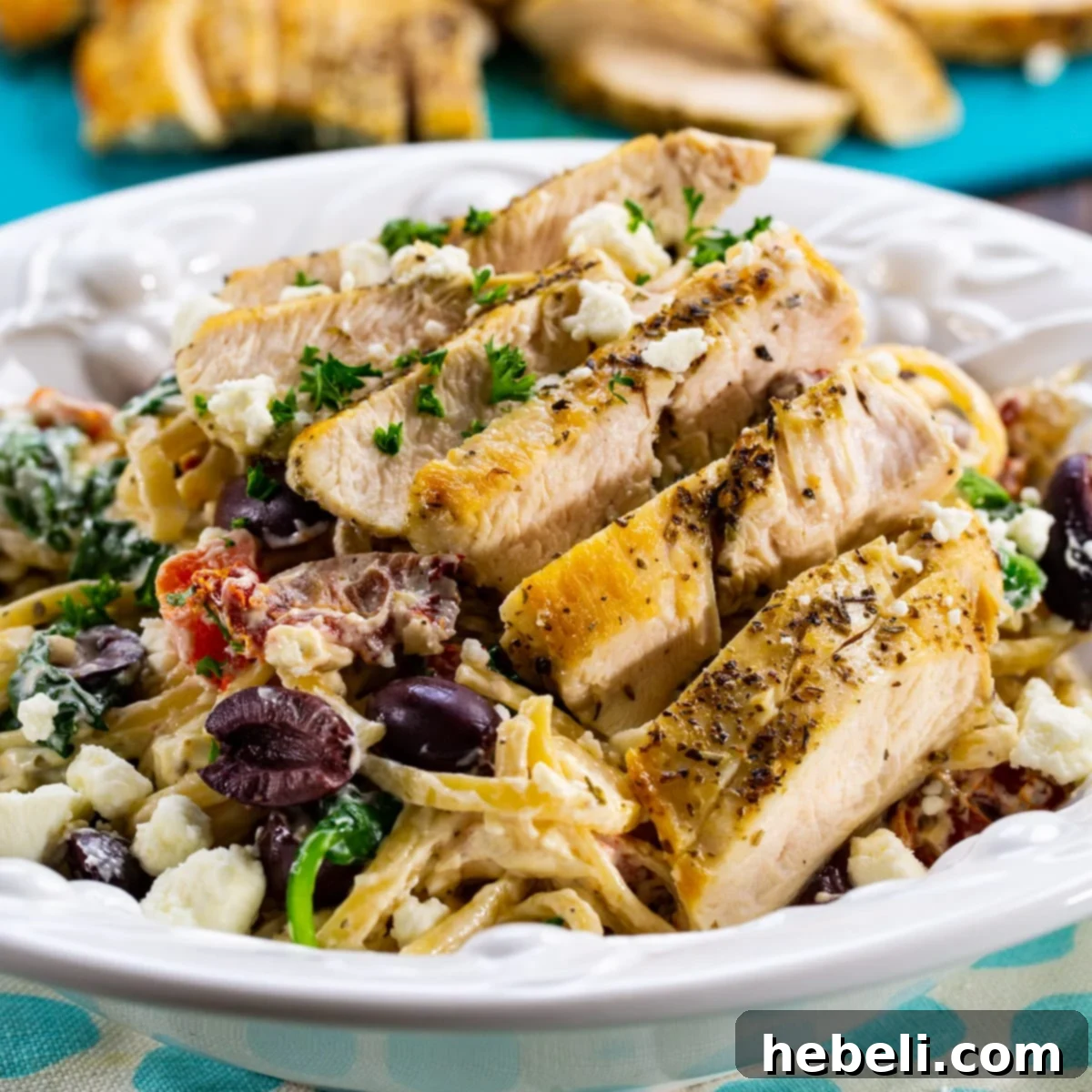 Zesty Greek Chicken Pasta 2 Greek Pasta with Chicken in a pasta bowl.