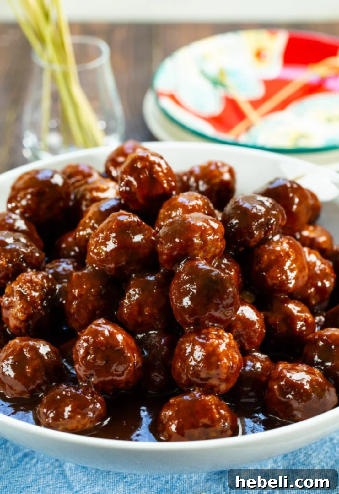 Sweet and Spicy Grape Meatballs 4 Spicy Grape Meatballs in a decorative serving bowl, ready for a party.