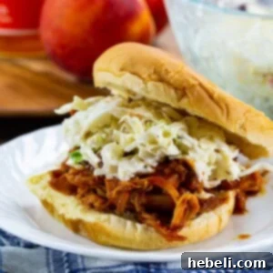 Slow Cooked BBQ Peach Pulled Chicken 5 Slow Cooker BBQ Peach Pulled Chicken ready to serve.