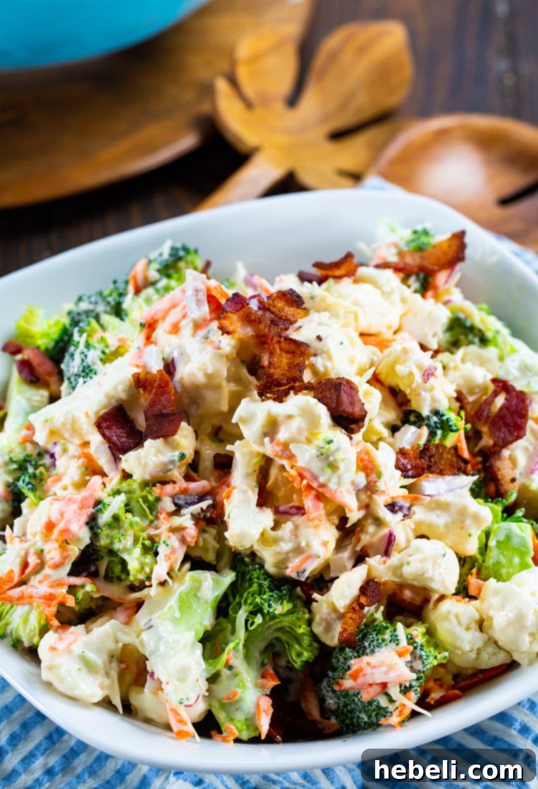 Zesty Marinated Broccoli and Cauliflower Salad 3 A vibrant and refreshing Marinated Broccoli and Cauliflower Salad presented in a pristine white serving bowl, ready to be enjoyed.