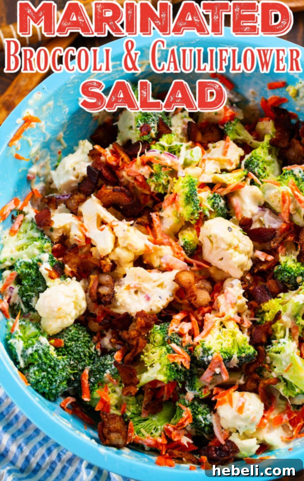 Zesty Marinated Broccoli and Cauliflower Salad 4 A large blue bowl filled with a generous serving of Marinated Broccoli and Cauliflower Salad, perfectly garnished and ready to be enjoyed.