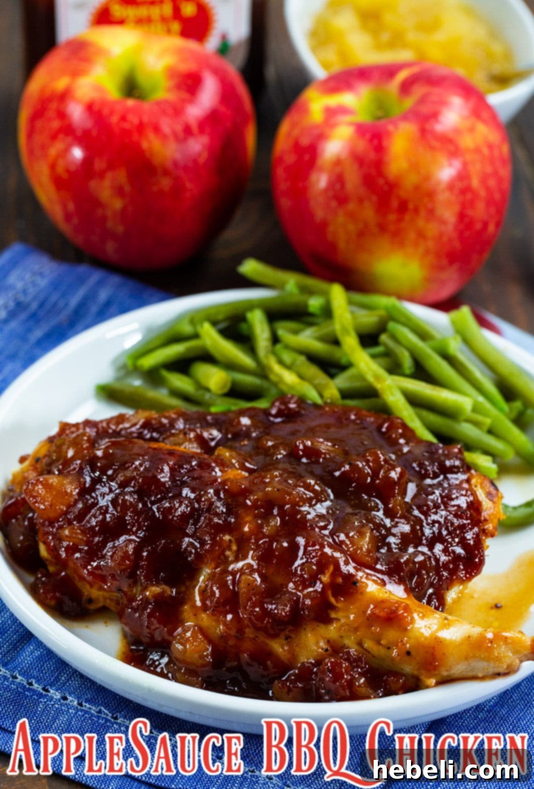 Close-up of Applesauce BBQ Chicken on a plate with fresh green beans.