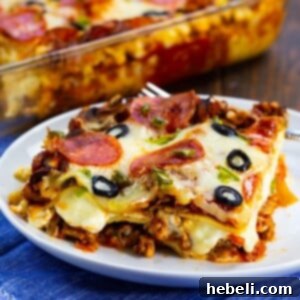 A small image of Pizza Lasagna, showing a golden brown top with melted cheese and pepperoni, representing the finished dish.
