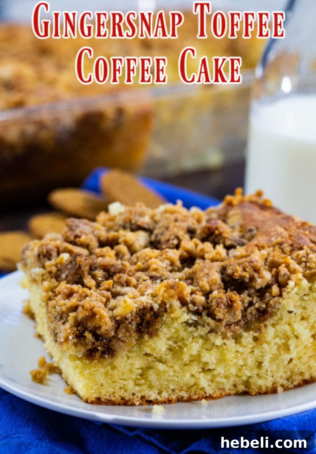 Another perspective of a slice of Gingersnap Toffee Coffee Cake on a plate, highlighting the dense, moist cake and the rich, crunchy topping from a different angle.