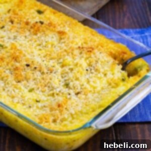 Finished Cheesy Mashed Potato Casserole with a golden topping, ready to be served.