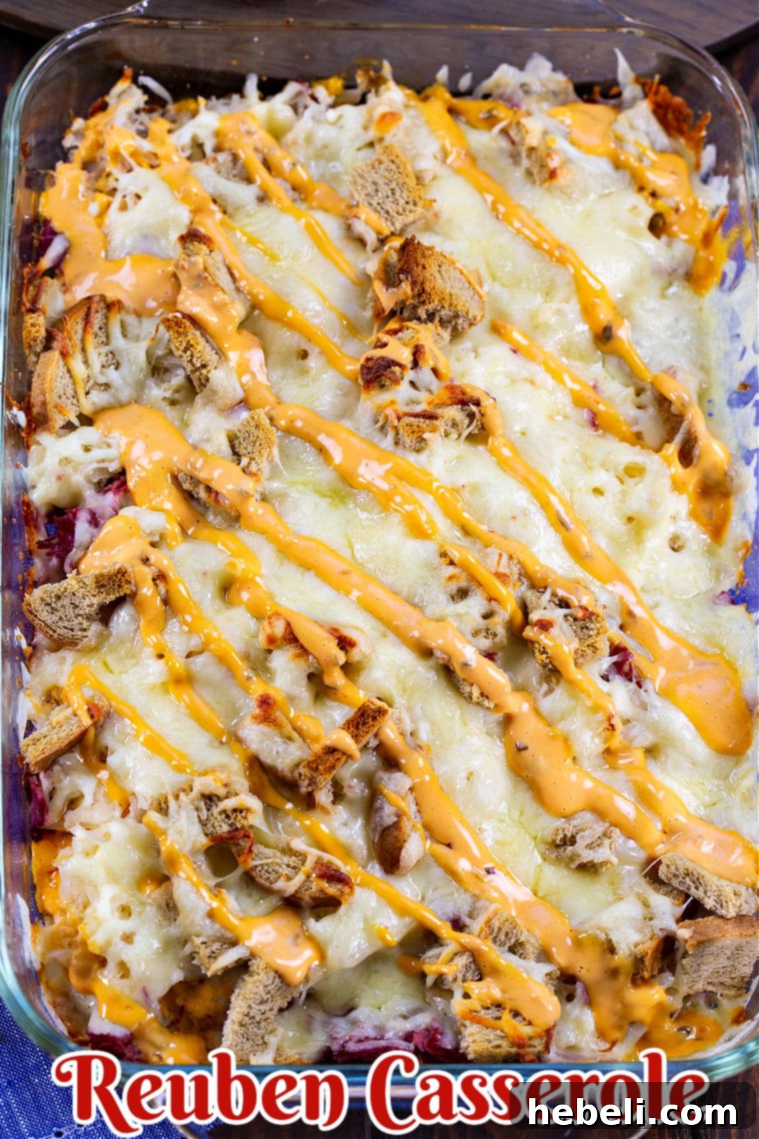 The Ultimate Reuben Casserole 3 Finished Reuben casserole, golden brown and bubbly, in a 9x13-inch baking dish.