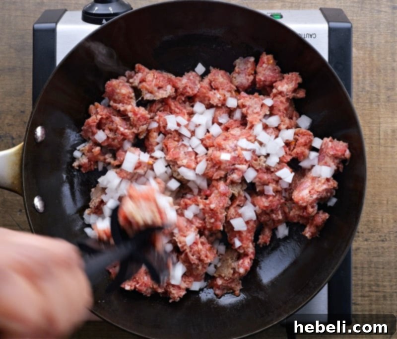 Savory Sausage and Spinach Swirl 4 Filling for sausage bread, with browned sausage and onions seasoned with herbs.