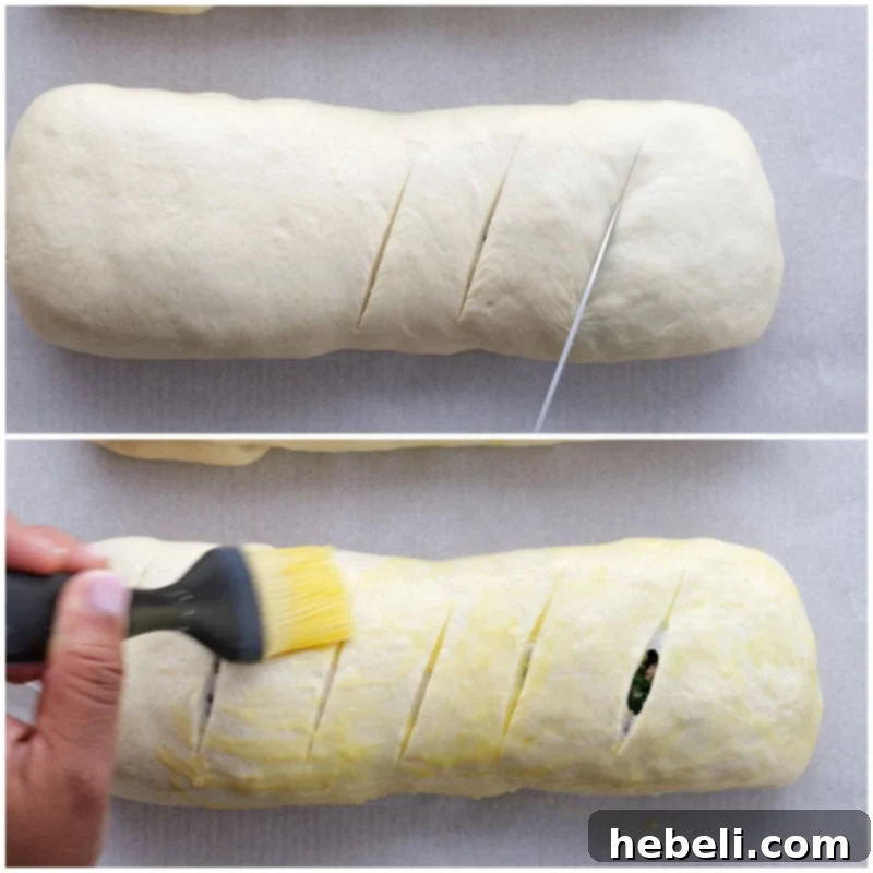 Savory Sausage and Spinach Swirl 10 Cutting small slits into the top of the bread loaves and brushing them with an egg wash for a golden crust.